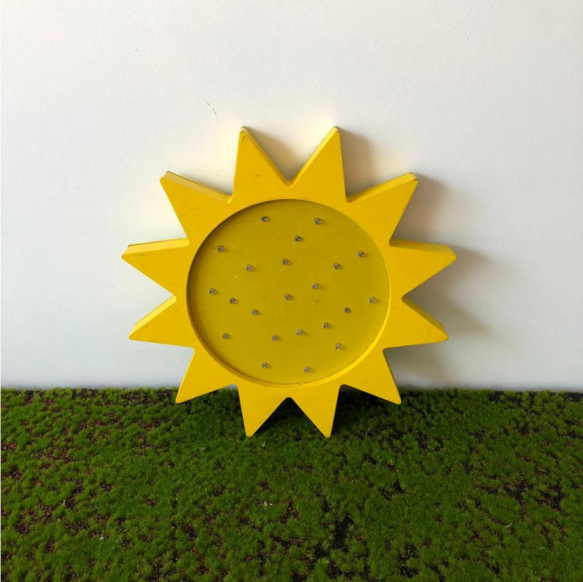 Sol decorativo (apenas decorativo, não acende)