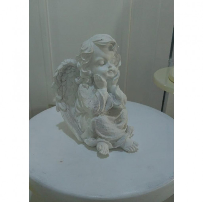 ANJO SENTADO